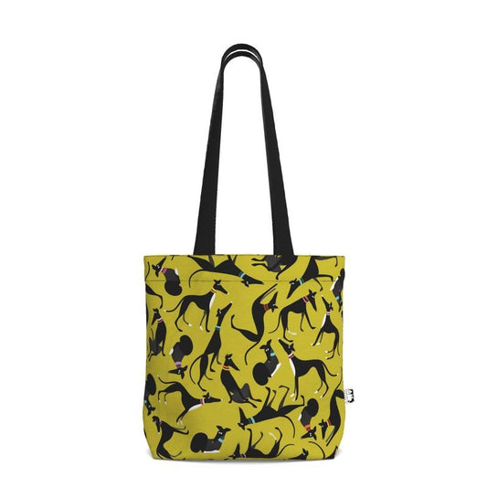 Front view of a Lime tote shopper with a black handle. The repeat pattern on the main body of the shopper is a repeat pattern cute illustrations of black and white greyhounds in various poses.