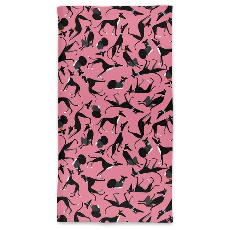Front image of tube neck scarf with a pink background. The pattern is a repeat pattern of cute black and white greyhounds in various poses.
