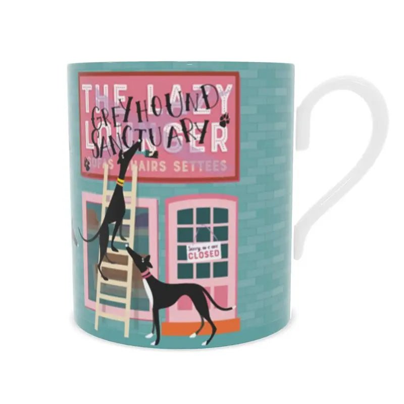 Front view of a bone china mug. The background is turquoise with a brick motif. The image shows the front of a sofa shop called the Lazy Lounger. It is currently closed. There is a greyhound standing up a ladder with a paintbrush in their mouth. They have painted 'Greyhound Sanctury' over the top of the shop sign. There is a 2nd greyhound keeping watch.
