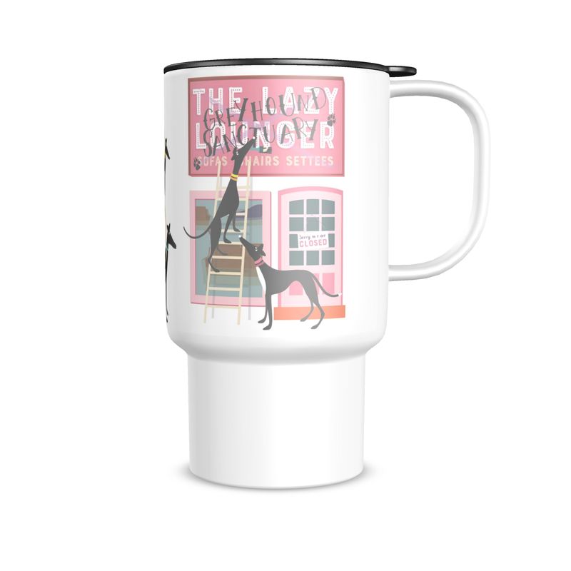Travel mug with a handle and a lid. The lid is black. On the front of the mug is image of the front of a sofa shop called the Lazy Lounger. The shop is closed. There is a greyhound on a ladder with a paintbrush in their mouth. They are painting Greyhound Sanctury over the top of the shop sign. A 2nd greyhound is watching from the ground.