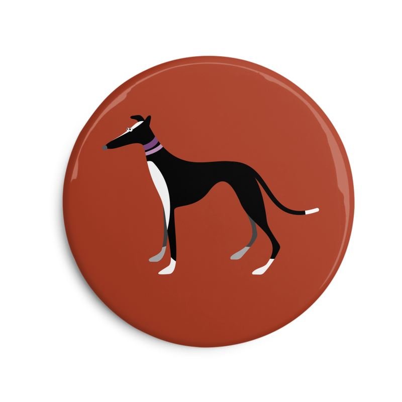 Fridge Magnet. 6cm Round. Showing an  illustration of a cute black & white greyhound. The background is rust. The dog collars are purple.