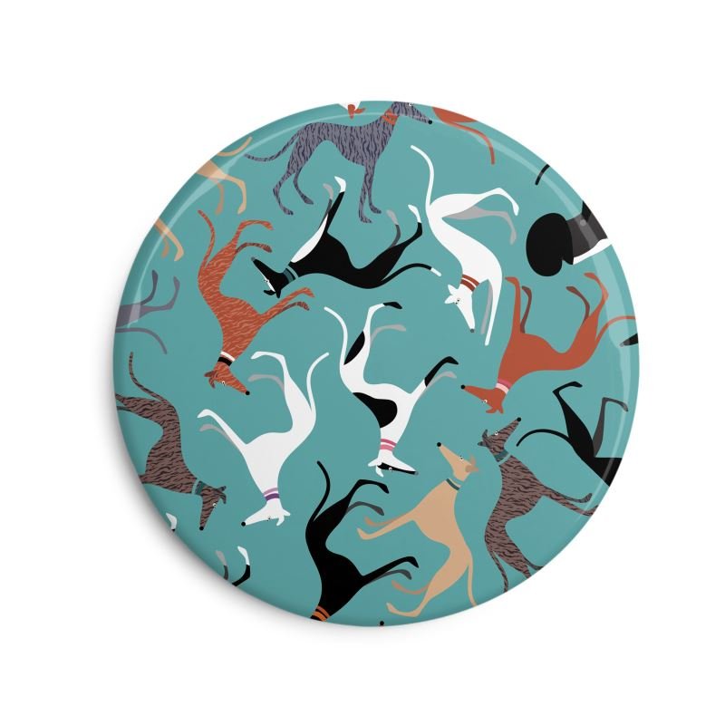 Fridge Magnet. 6cm Round. Turquoise background with repeat pattern showing illustrations of cute greyhounds with coat colours.